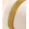 Gold color fashion bracelet with a textured mesh design for artificial jewellery online shopping in Lahore.